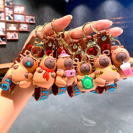 ZABAWKA KAPIBARA Z PLECAKIEM PLUSZOWA 35 CM Z PLUSZOWYM ŻÓŁWIEM PLUSZAK