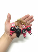 BRELOK SQUID GAME STRAŻNIK (KÓŁKO/KWADRAT/TRÓJKĄT) FIGURKA 3D 6.5 cm